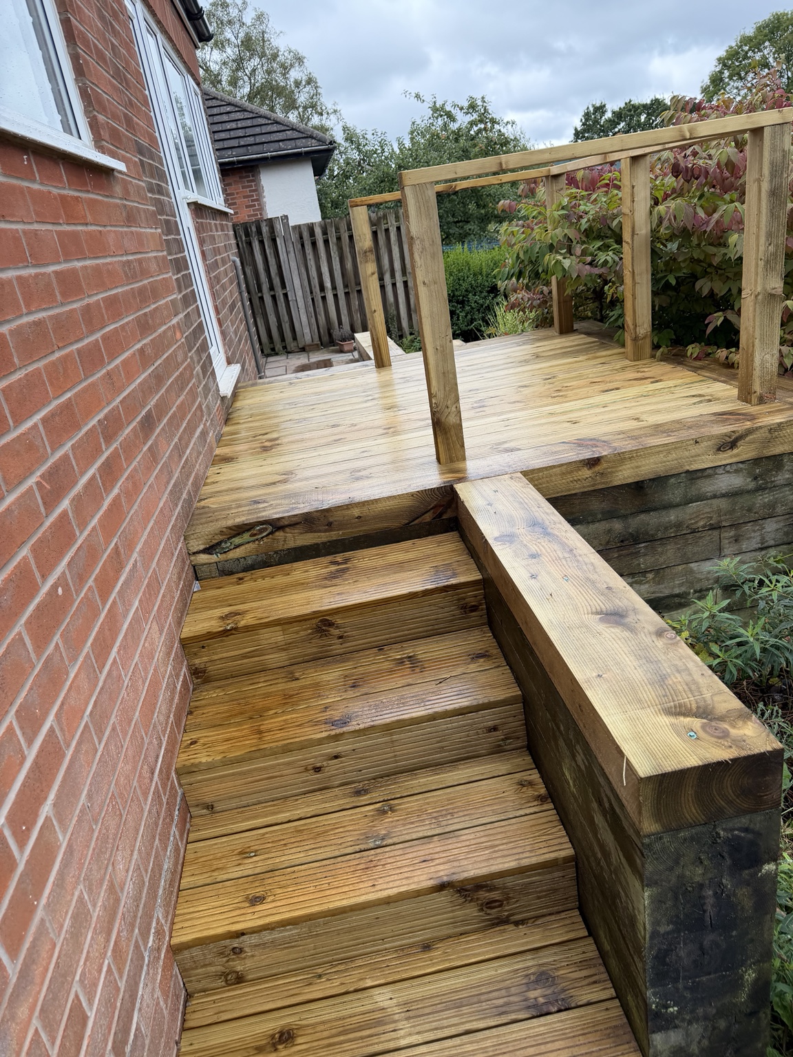 Bespoke timber decking and pergola built by Smethurst Outdoor Living